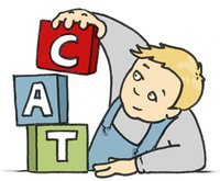 Child spells 'CAT' with blocks